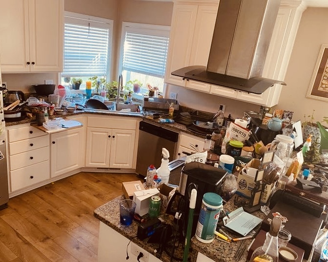 Before cleaning – cluttered room